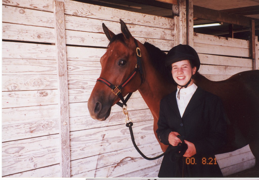 Me on Wikkit in 2001 at state 4-H Fair.  I got a medal in dressage and trail and did well in the rest.  It was a high point of my horsie years and this picture makes me miss my old friend and companion Wikkit.  I'm really, truly and deeply feeling.... feeling a lot of ressurected hopeful feelings about doing horses again since our new house is two doors down from a nice 4-H arena!
