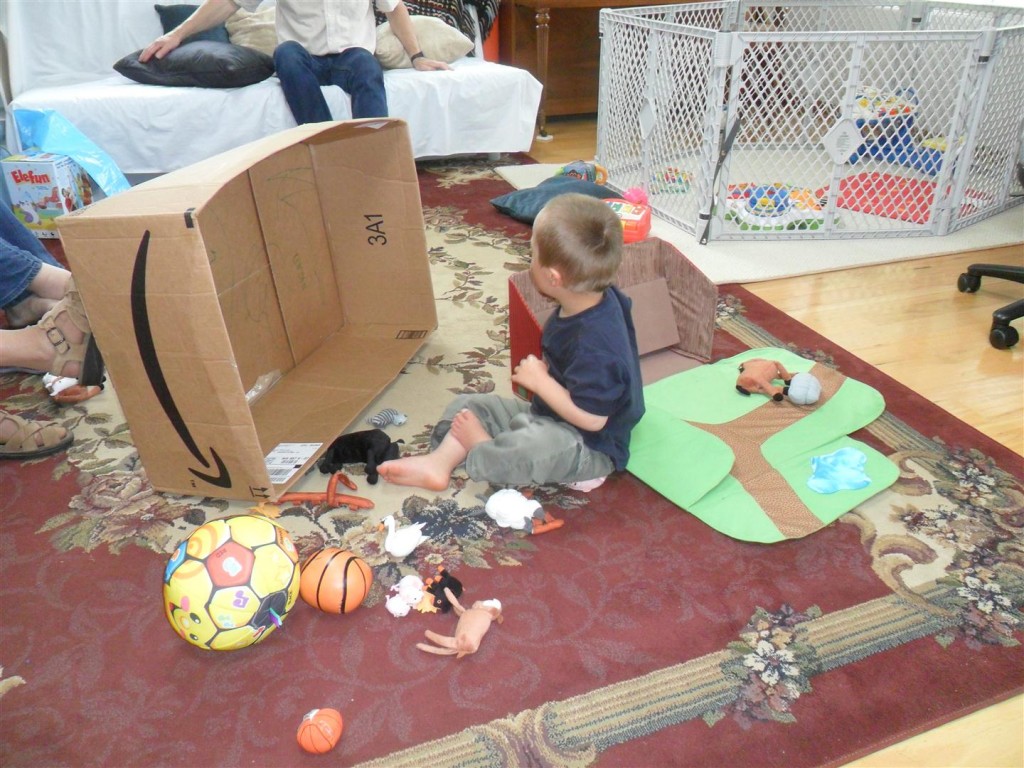 Jordan in a pile of toys!