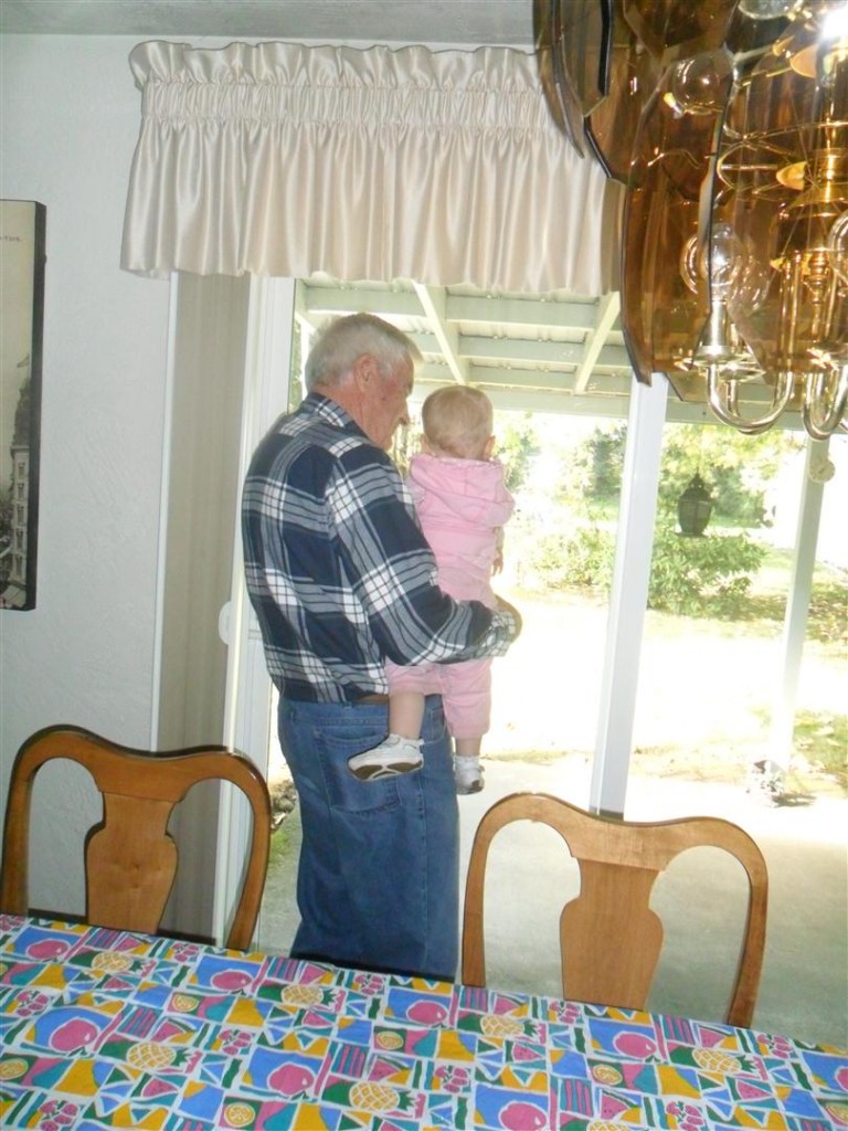 I have a picture just like this, but it's Grandpa holding Anna!