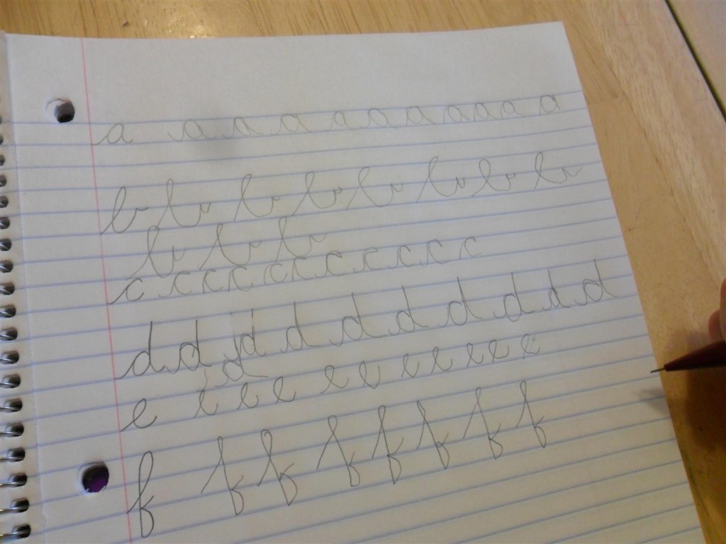 Anna is learning cursive!  My letter on the left, hers to the right.  She is better at this than printing!