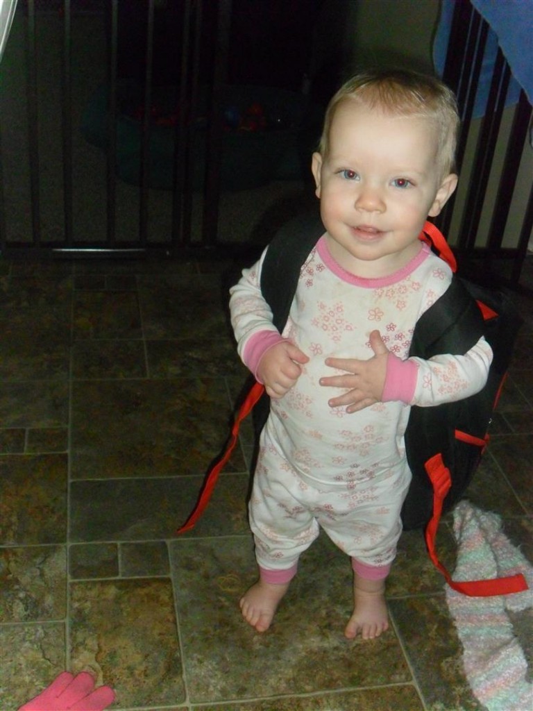 Carolyn wanted to wear Jordan's preschool backpack when he got home one day.  (Yes, she was still in jammies at 4pm)