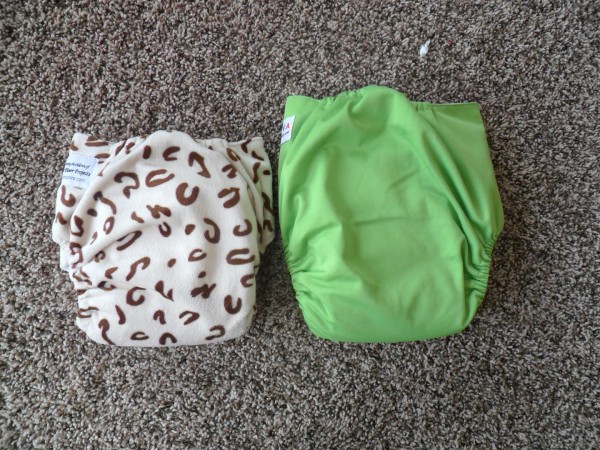 Comparison of typical one-size diaper and "big baby diaper"  This is an assuntastore diaper, which is just barely bigger than a BumGenius one-size.
