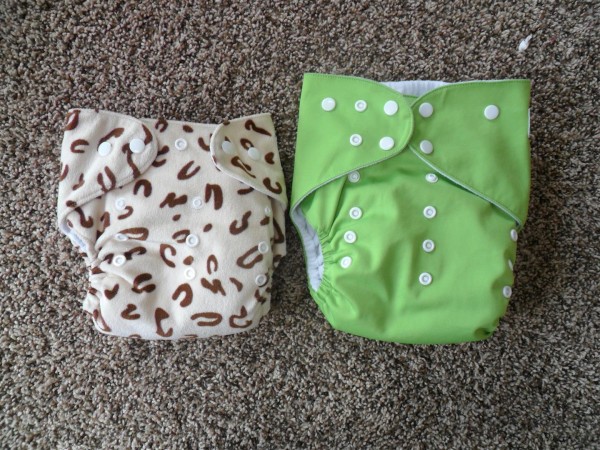 The front of a typical one-size pocket diaper and the Alva Big Baby diaper.