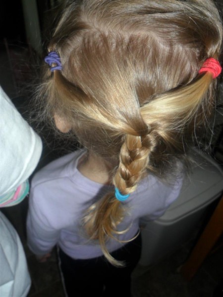 My mom gave my kids' hairdressing play... I didn't know Maggie's hair could be so fancy when it is so short!
