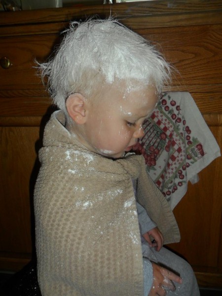 She smeared GOBS of Vaseline in her hair.  I could not get it out.  Finally, I rubbed corn starch into her vaseline slick and it soaked it up.  She left corn starch smears all over the house, but it was better than straight petroleum jelly smears.  Oh dear... some days.