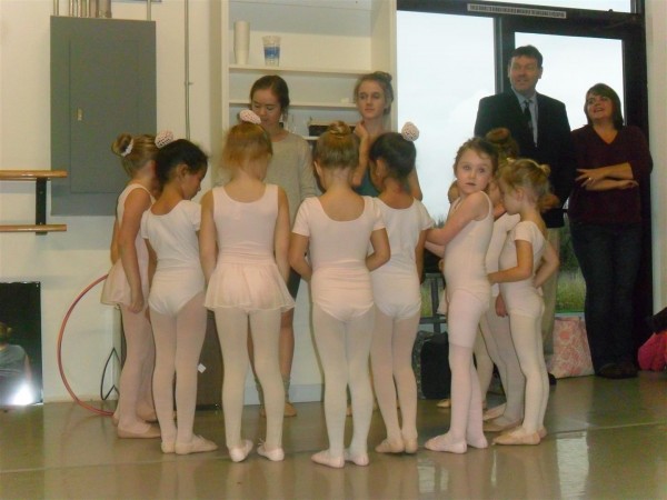 Praying before ballet class!  (Maggie's class is not usually this large)