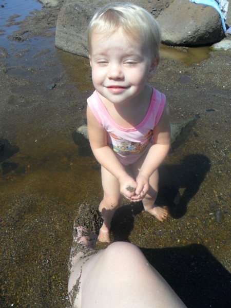 haha - she was having so much fun putting sand on my foot.