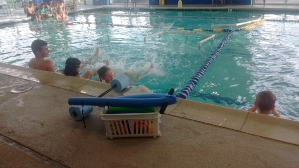 Maggie in her swimming lessons! She swam without a floatie in deep water for the first time in this class. She can swim without help from one place to another, so long as they aren't too far apart.