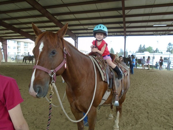 The rodeo had free pony rides! Look at my big girl!