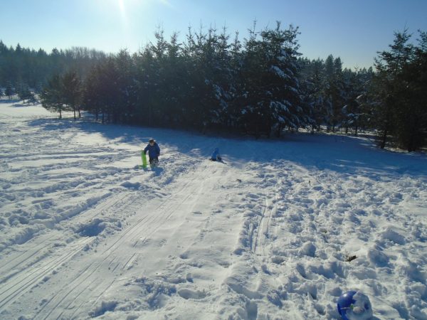 A friend invited us to sled on their hill! So we put on chains and headed over twice!