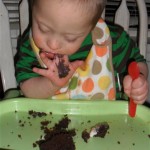 The cupcakes were definitely a hit. Sadly, most solid foods turn to mush and slide down his fingers to his palm....