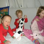 This one of the kids opening their stockings makes me laugh. All three expressions. lol You'll notice Maggie looking groggy in most pictures... she struggled to wake up for hours!