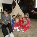 We were trying to get a picture of all the grandkids in front of the teepee full of presents. For some reason Maggie just melted down. Poor Maggie... I laugh at this picture! (and had the pleasure of snuggling with her after taking pictures)