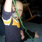 At Grammy's.... finally a toy I love! It's a cat toy rattle on a string. Silly boy. But it's exactly what he likes!