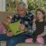 Great Grandpa reads the Swapping Boy to the kids.