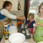 Mindy helping me out and blessing my girls with fun time.... blueberry muffins in this picture.