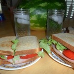 Delicious summertime dinner.... fresh tomato sandwiches, watermelon and peaches!