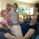 The midwives came out for an appointment at our house this week! Here are the girls listening to Carolyn's heart. Precious sisters... all three.