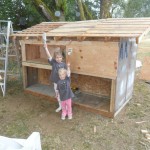 Doesn't the coop look great!? And here are the girls - ready to help Papa paint! I love that we had a big outdoor painting project that we could let them help with!