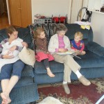 Great-Grandma Joan got to come for a visit with Uncle Kevin! Uncle Kevin brought a beautiful Sapphire for Carolyn (her birthstone). Here is Grandma reading Dr. Seuss to the girls.