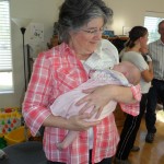 Grandma snuggling her granddaughter. Awwwww