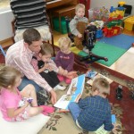 Five of them kiddos. :-D Jordan kept trying to scoot onto the book...