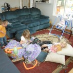 The kids having a play-time on the floor. Big development for Jordan is he is always trying to insert himself into Anna and Maggie's games. He doesn't know how to play yet, but he gets himself into the middle of things! Go Jordan!