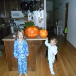 Proud pumpkin carvers. (Even though Papa did most of it)