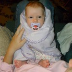 She almost never takes a pacifier... but does sometimes. This picture cracks me up... arms swaddled, legs frogged. Cute!