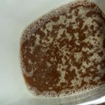 Yeast settling into the cider. That's right... we're brewing hard cider.