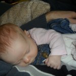Home and asleep in Papa's arms. Cute!