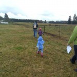 Tromp, tromp, tromp. We have made quite the impression with the real estate agents as we unload the van. Anna and Maggie had fun kicking apart cow pies at this place.