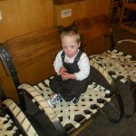 Jordan climbed right into a chair by the fire inside the Timberline Lodge lobby.  He was one unhappy little camper... 